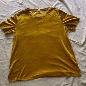 A mustard yellow shirt ‼️